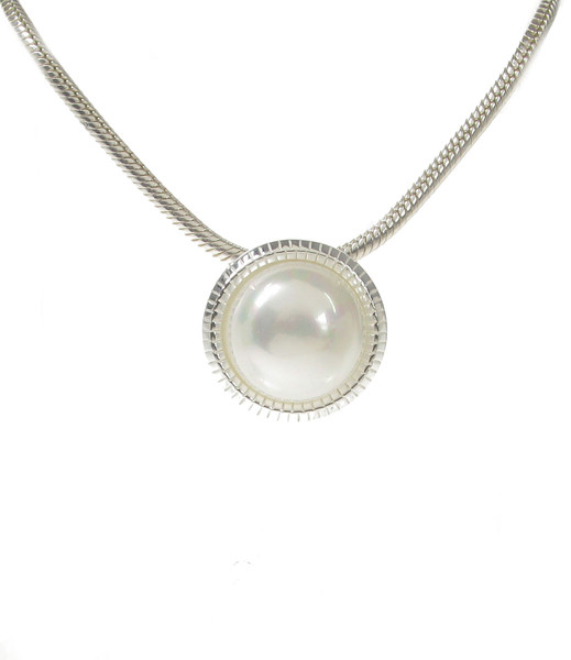 Sterling Silver and Pearl Centre Pendant with 18 - 20" Silver Chain
